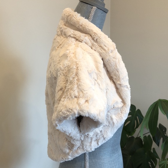 NWT- Make a statement with this beautiful bolo shrug, that is luxuriously soft. - Picture 2 of 8